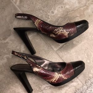 Snake print pumps.